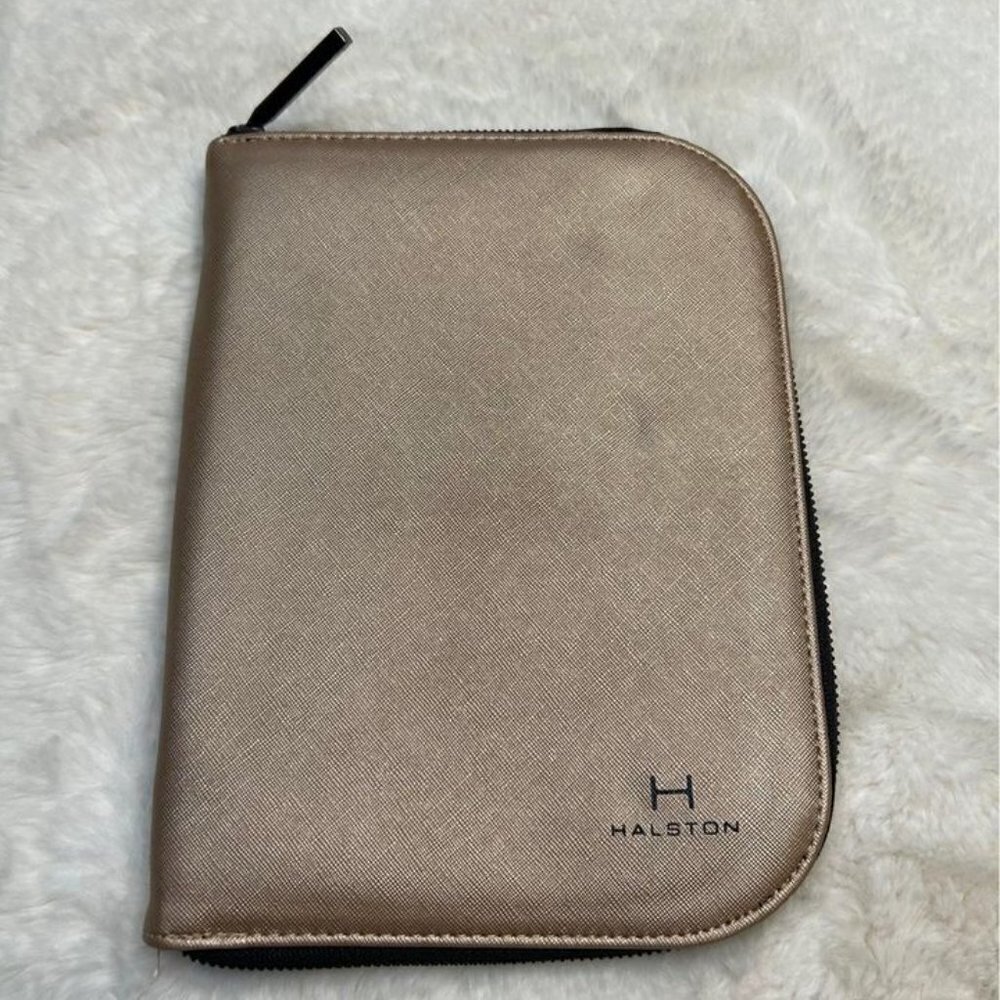 HALSTON jewelry travel case. Cooper bronze. Zipper closure, snaps for necklaces.